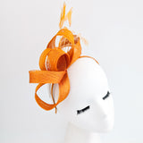 Burnt orange feather fascinator hat