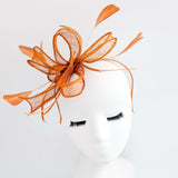 Burnt orange feather fascinator hat