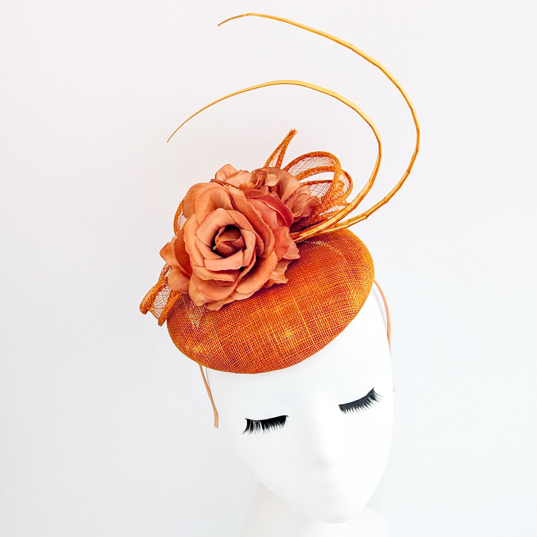 Burnt orange flower fascinator hat