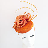 Burnt orange flower fascinator hat