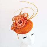 Burnt orange flower fascinator hat