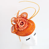 Burnt orange flower fascinator hat