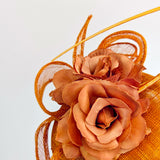 Burnt orange flower fascinator hat