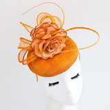 Tangerine orange flower fascinator hat
