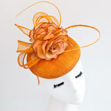 Tangerine orange flower fascinator hat