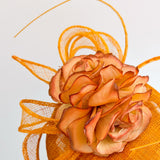 Tangerine orange flower fascinator hat