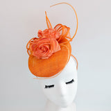 Bright orange coral flower fascinator hat