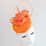 Bright orange coral flower fascinator hat