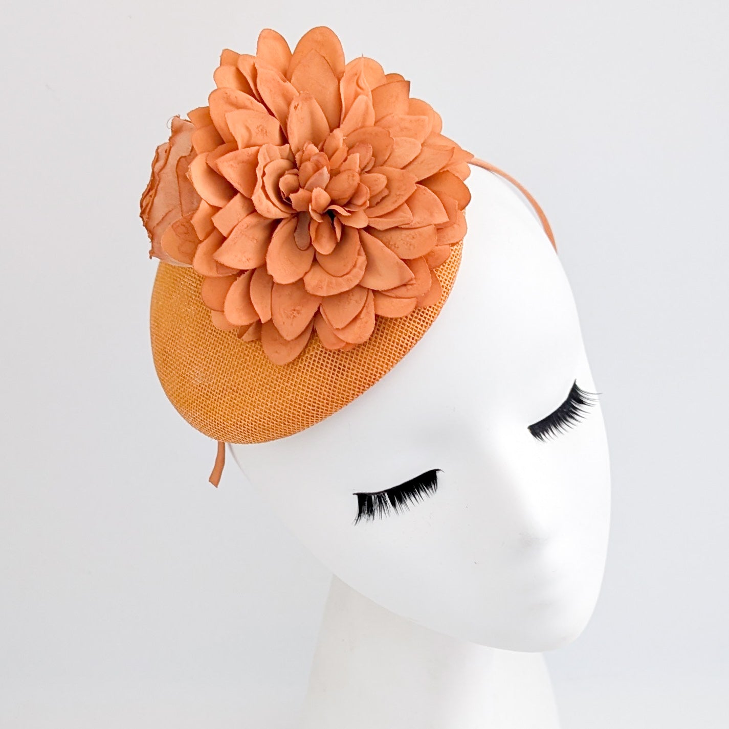 Light orange flower fascinator hat