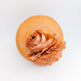 Light orange flower fascinator hat