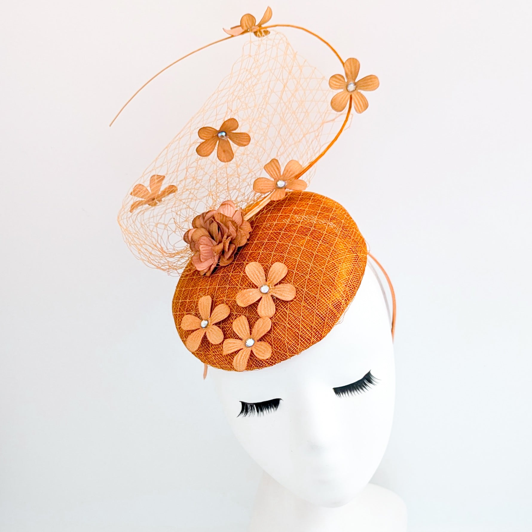 Burnt orange flower fascinator hat