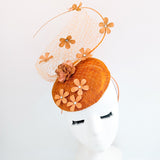 Burnt orange flower fascinator hat