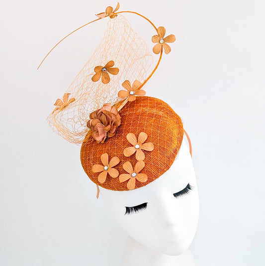 Burnt orange flower fascinator hat