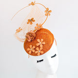 Burnt orange flower fascinator hat