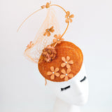 Burnt orange flower fascinator hat