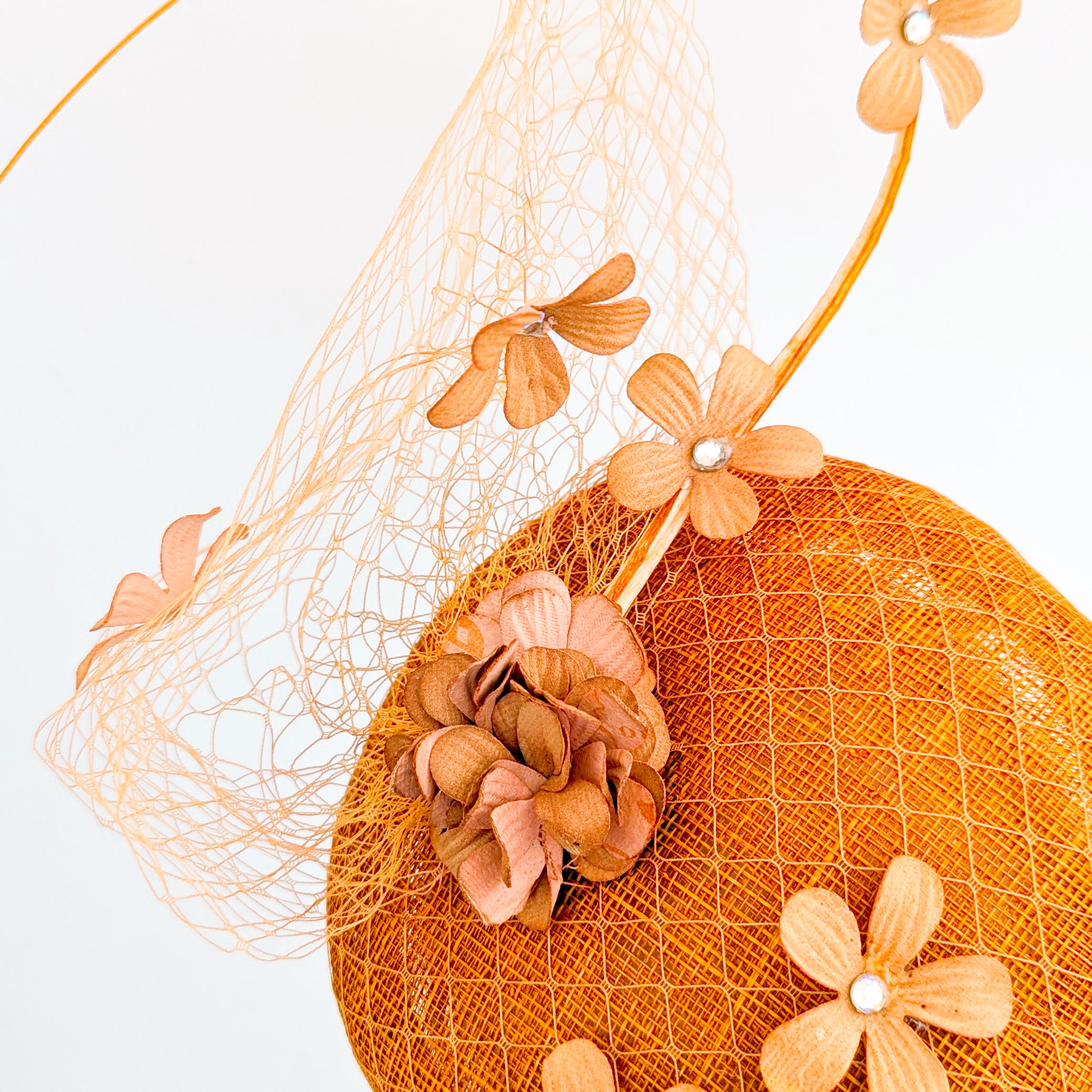 Burnt orange flower fascinator hat