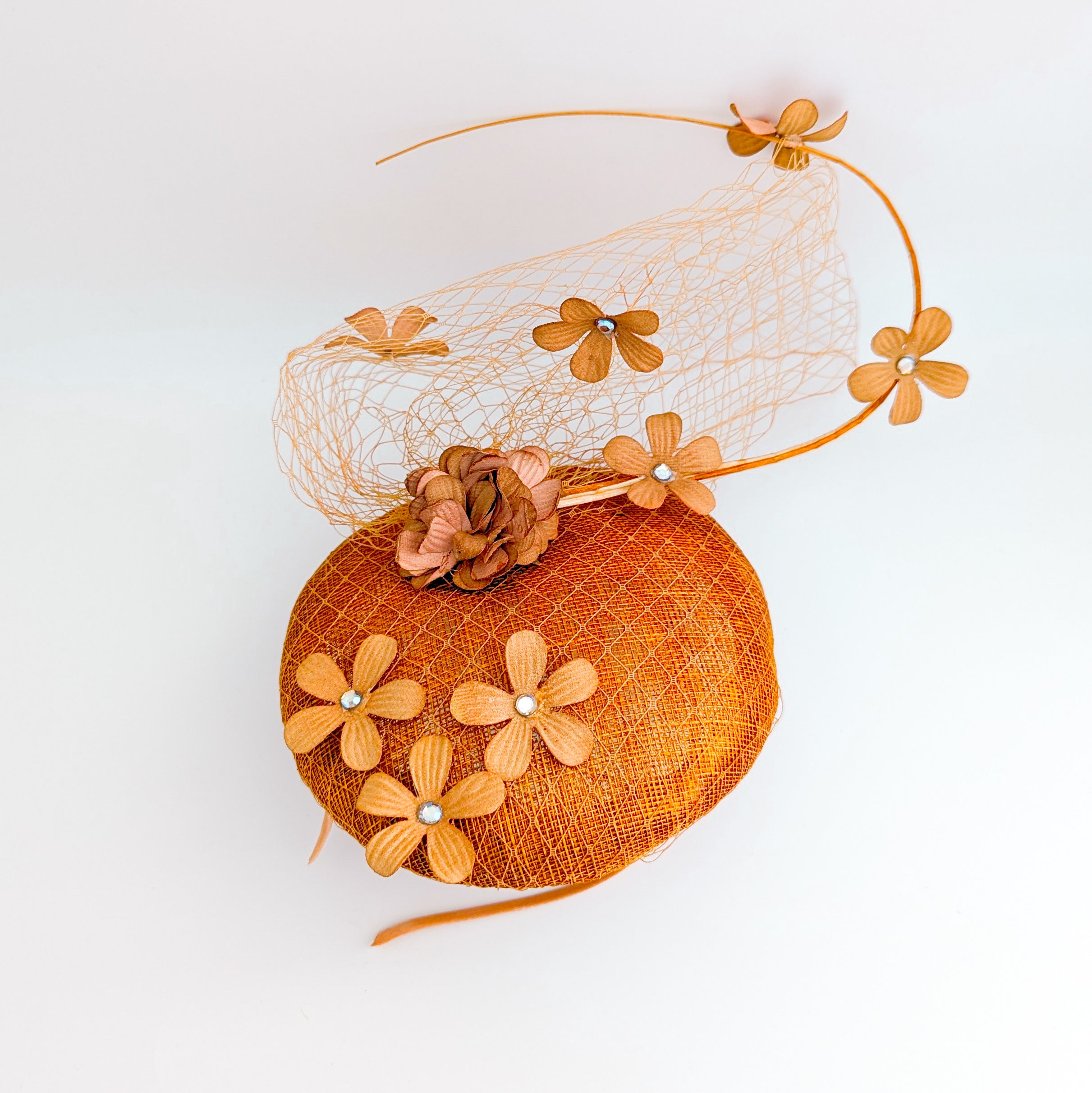 Burnt orange flower fascinator hat