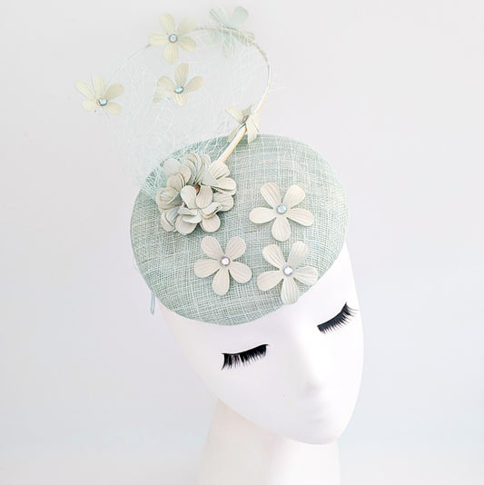 Light aquamarine blue flower fascinator hat