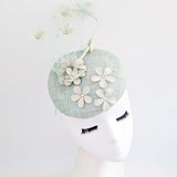 Light aquamarine blue flower fascinator hat