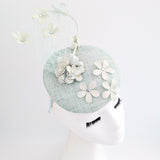 Light aquamarine blue flower fascinator hat