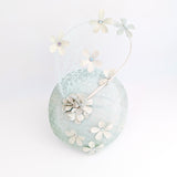 Light aquamarine blue flower fascinator hat