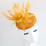 Tangerine orange feather fascinator hat
