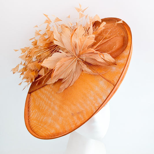 Terracotta dusty orange large feather oval disc fascinator hat