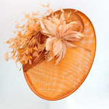 Terracotta dusty orange large feather oval disc fascinator hat