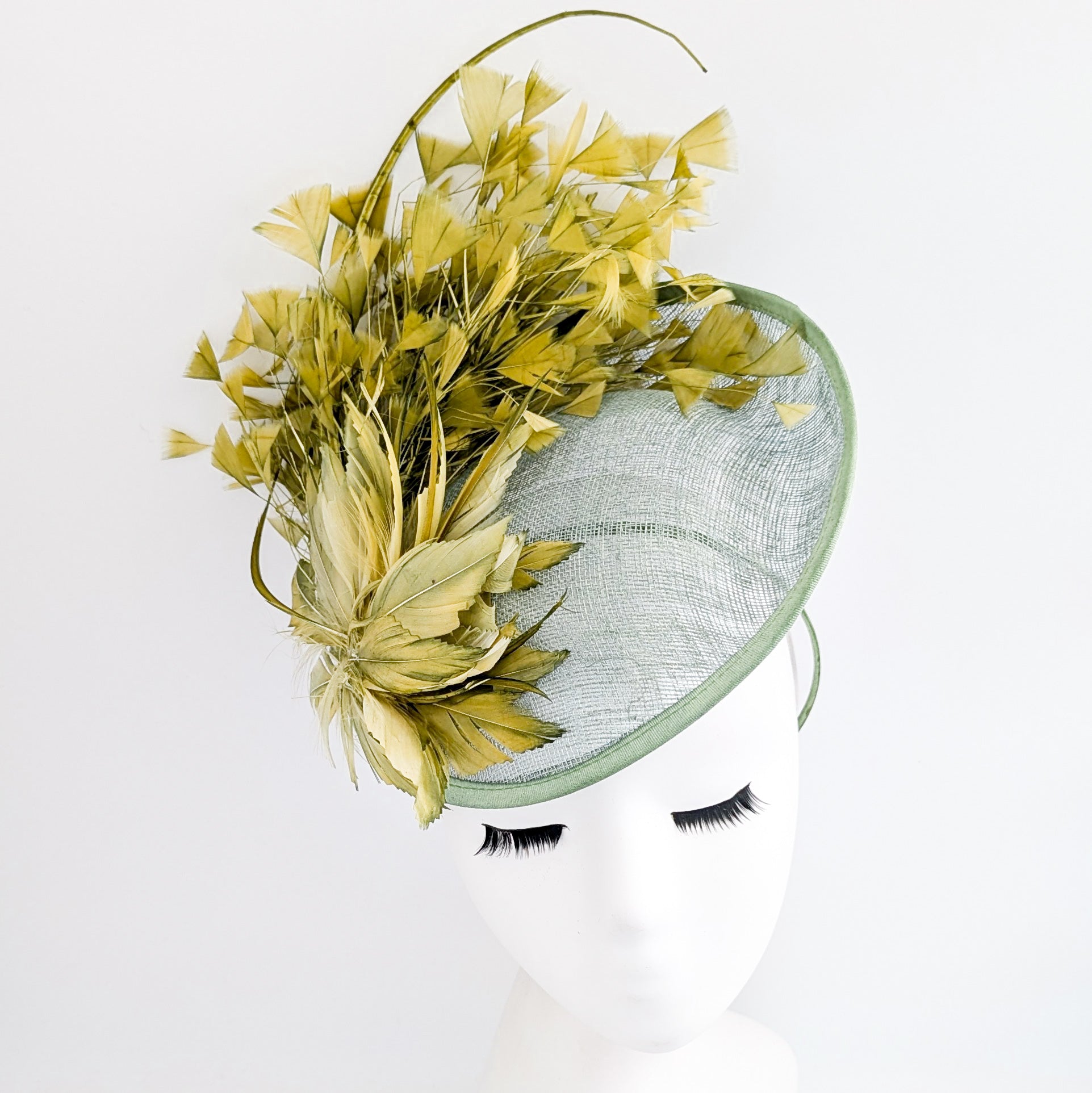 Chartreuse green feather disc fascinator hat