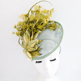 Chartreuse green feather disc fascinator hat