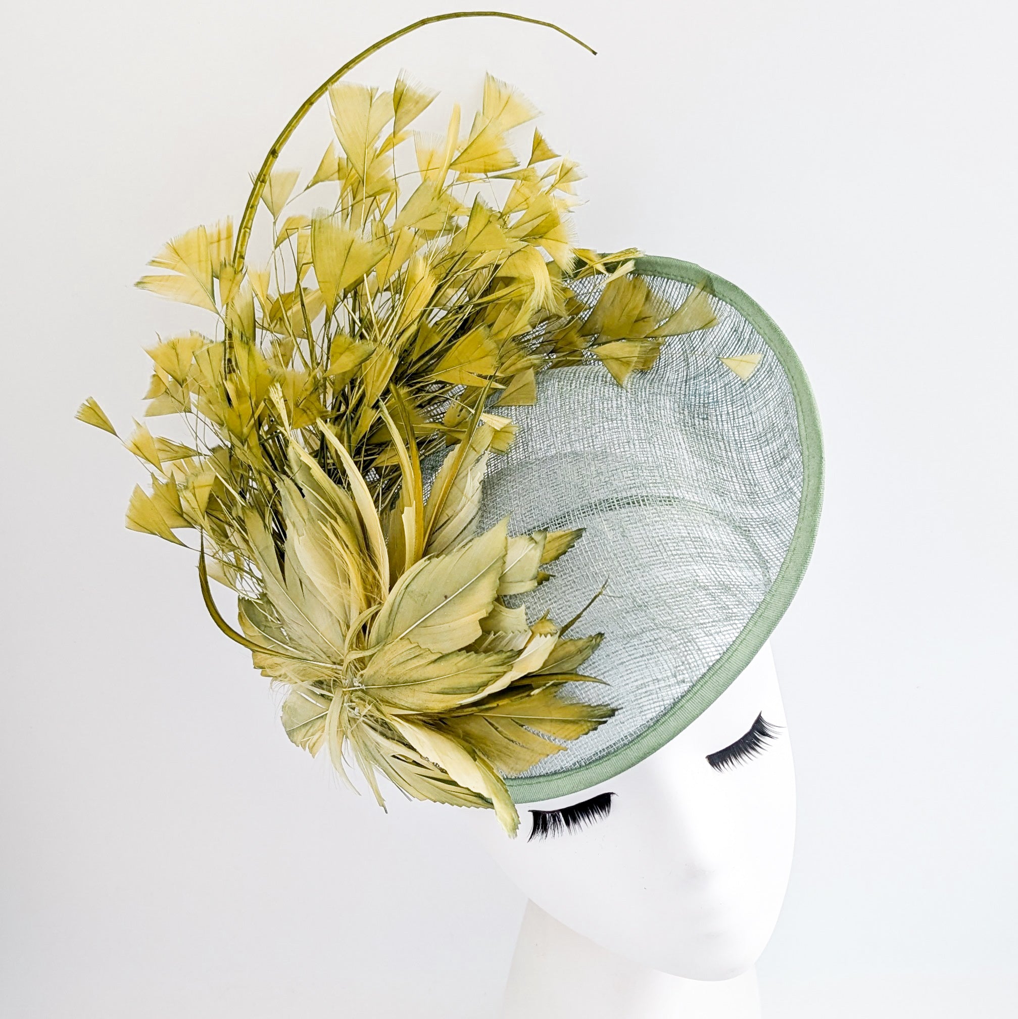Chartreuse green feather disc fascinator hat
