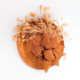 Burnt orange feather disc fascinator hat