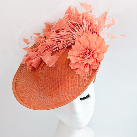 Terracotta dusty coral large flower feather disc fascinator hat