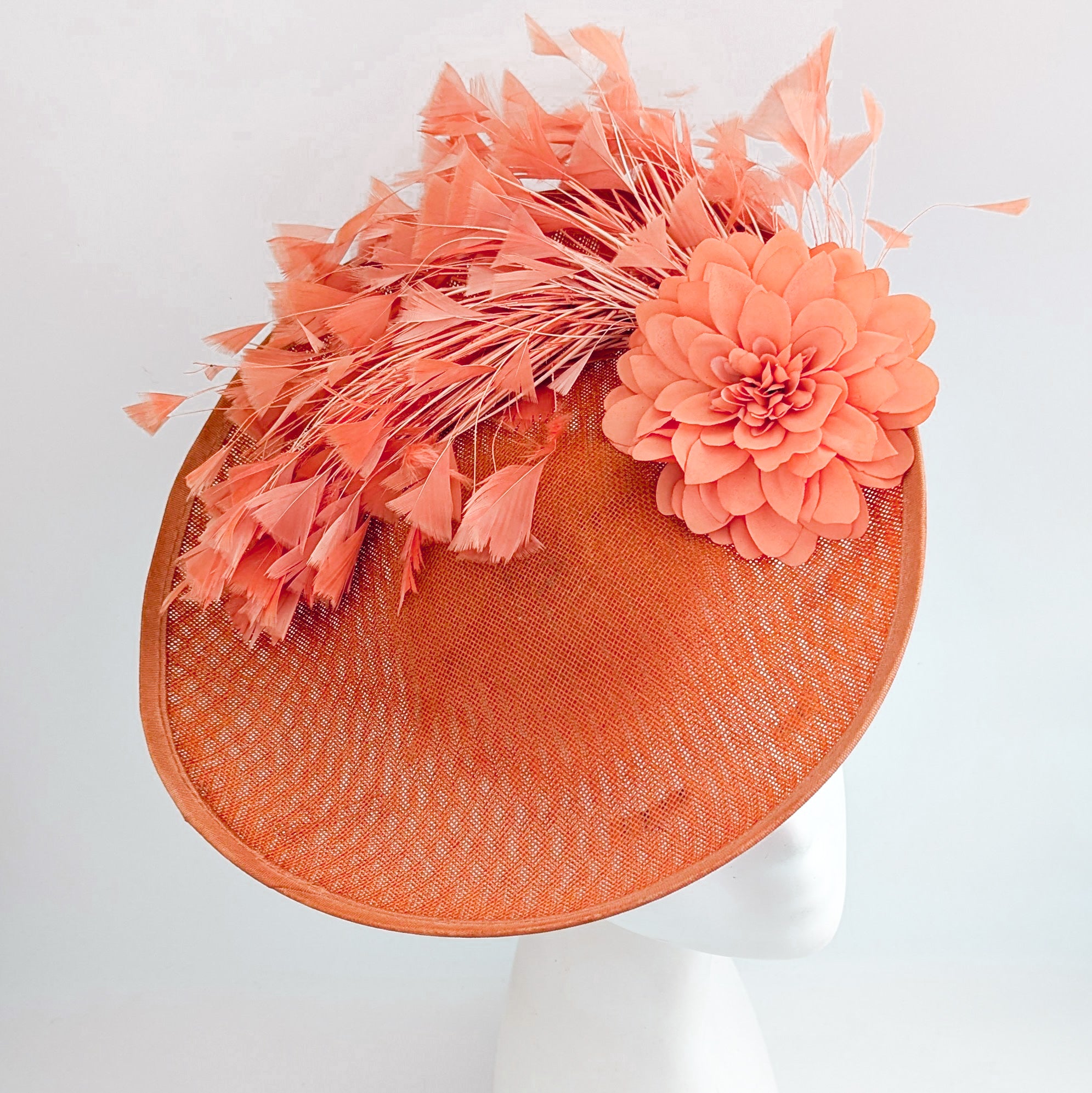 Terracotta dusty coral large flower feather disc fascinator hat