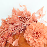 Terracotta dusty coral large flower feather disc fascinator hat