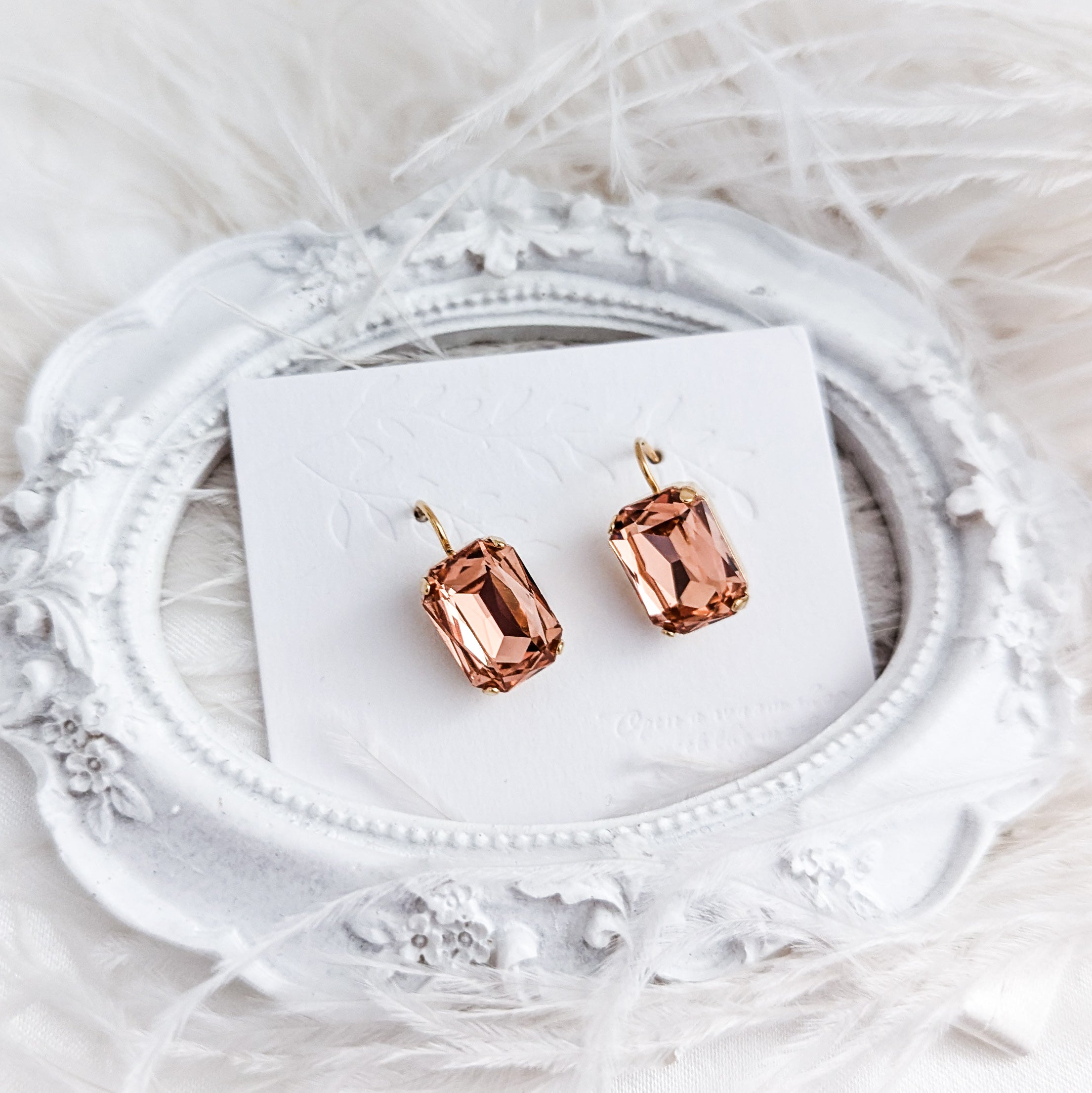 Light peach crystal gold emerald cut drop earrings