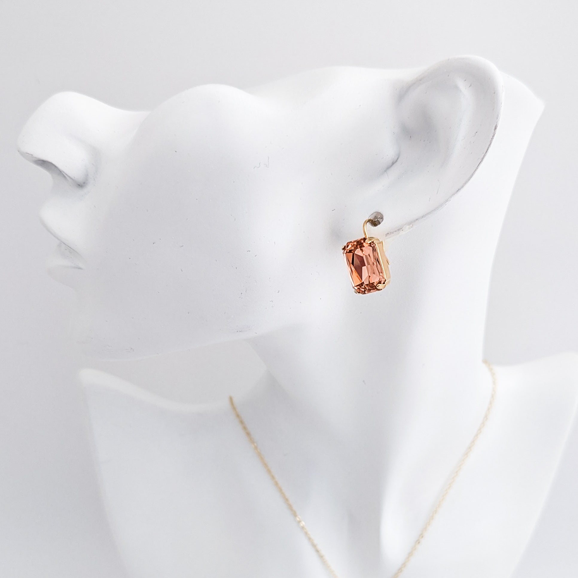 Light peach crystal gold emerald cut drop earrings