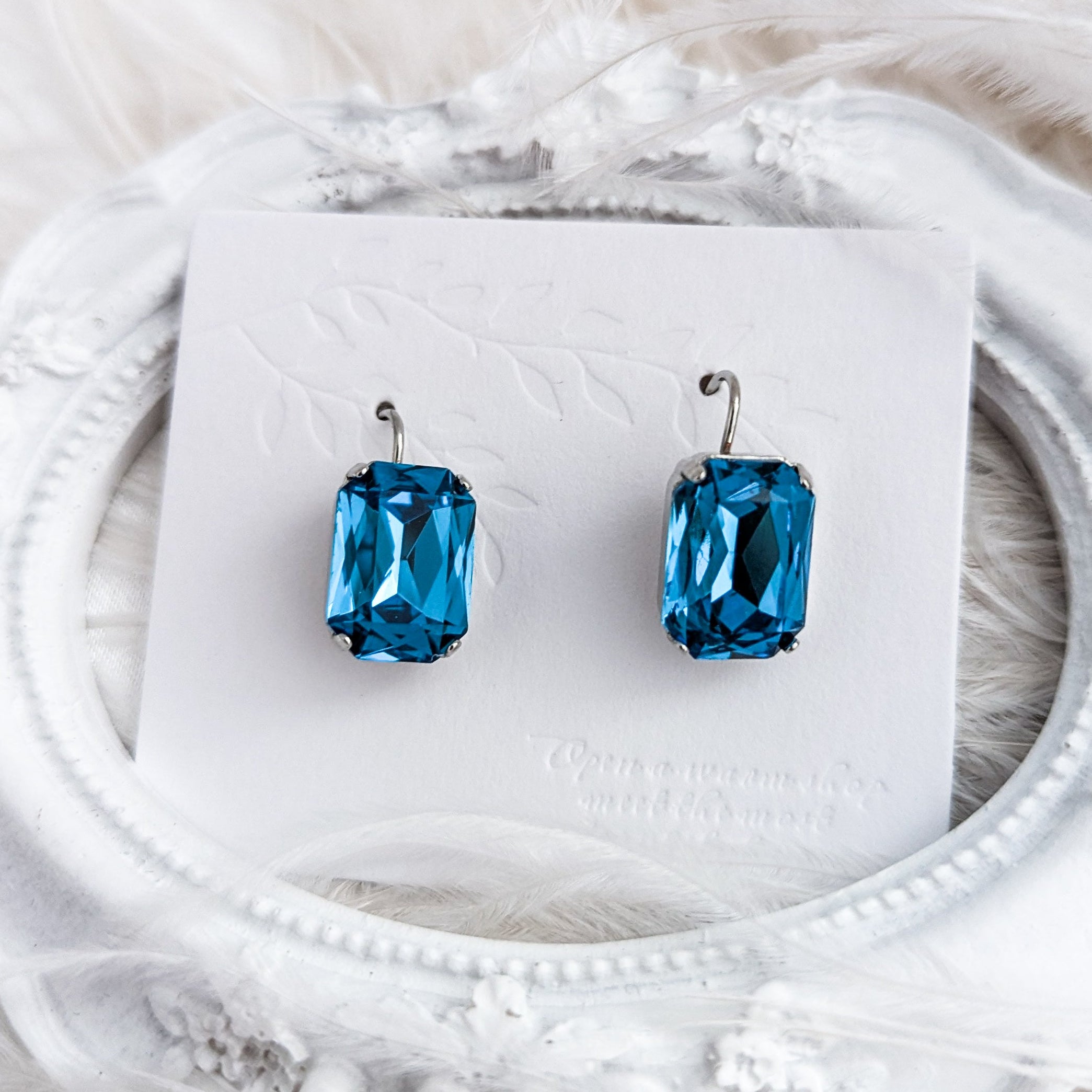 Aqua blue crystal silver emerald cut drop earrings
