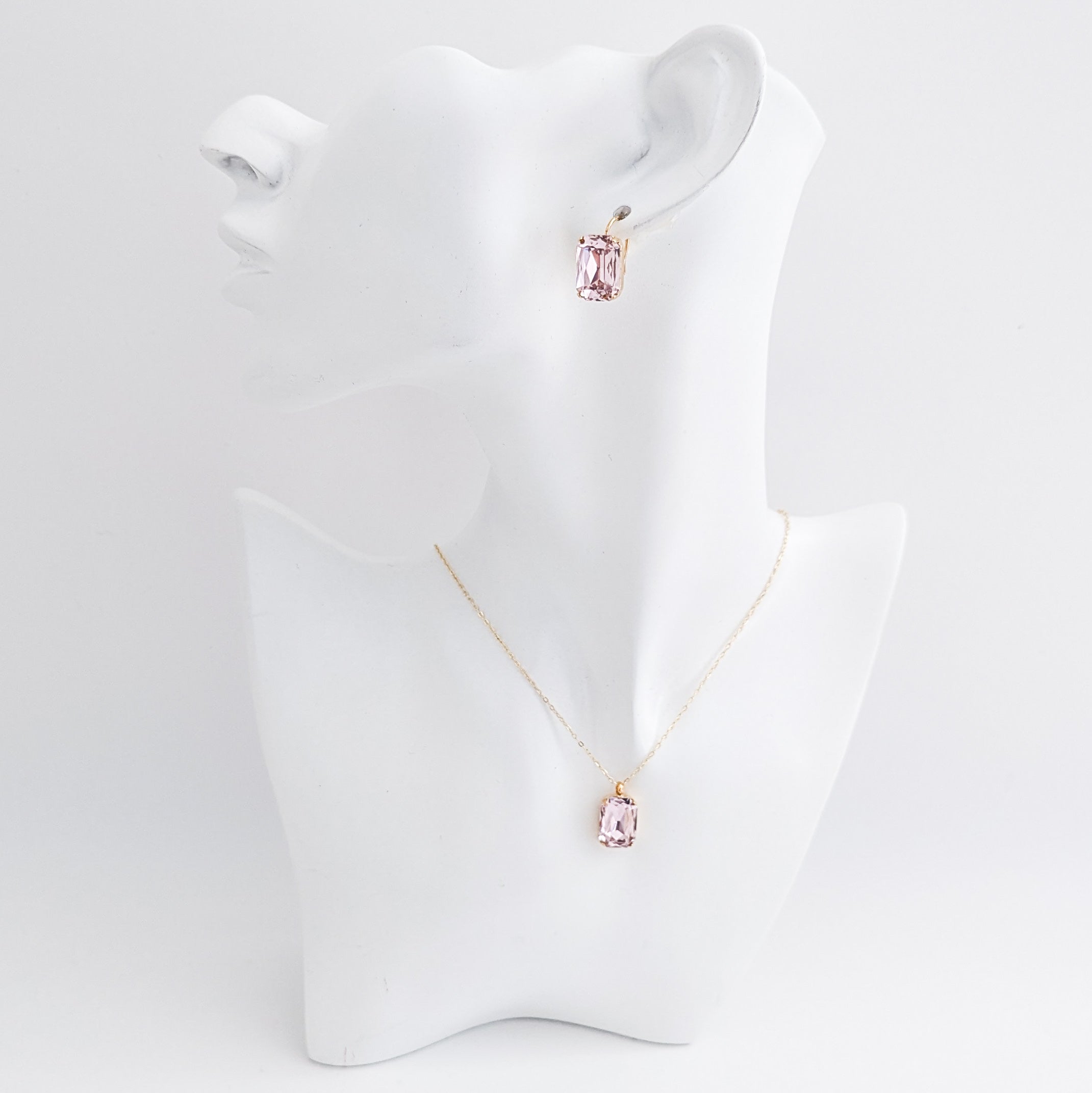 Light pink crystal gold emerald cut drop earrings
