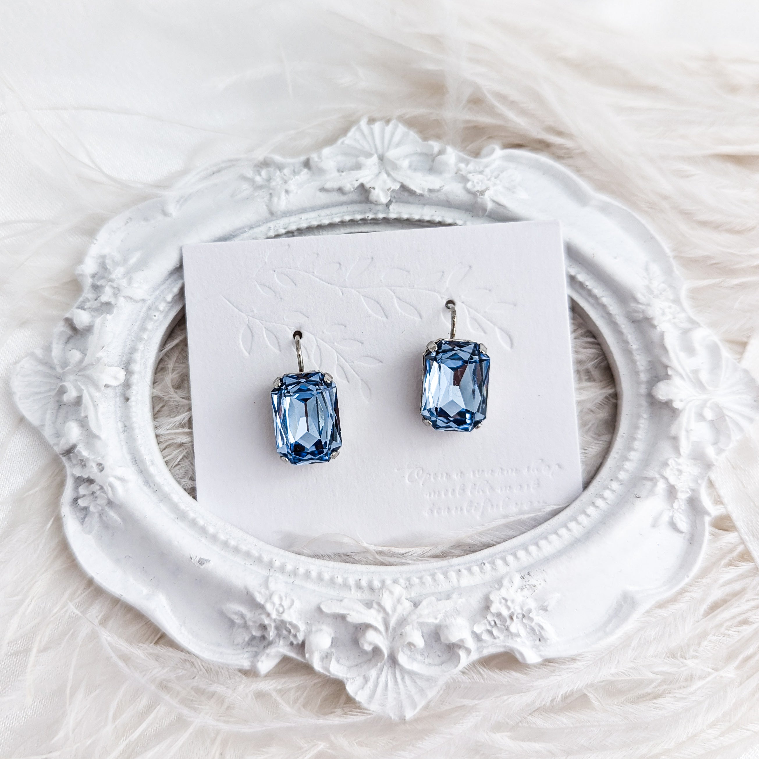 Light dusty blue crystal silver emerald cut drop earrings