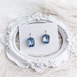 Light dusty blue crystal silver emerald cut drop earrings