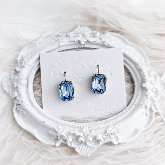 Light dusty blue crystal silver emerald cut drop earrings
