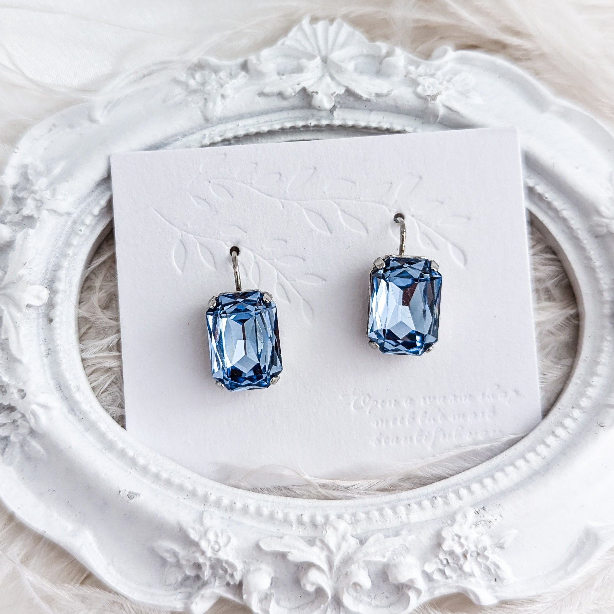 Light dusty blue crystal silver emerald cut drop earrings