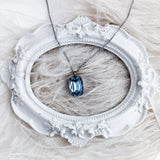 Light dusty blue crystal silver emerald cut necklace