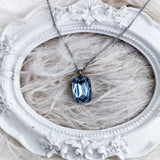 Light dusty blue crystal silver emerald cut necklace