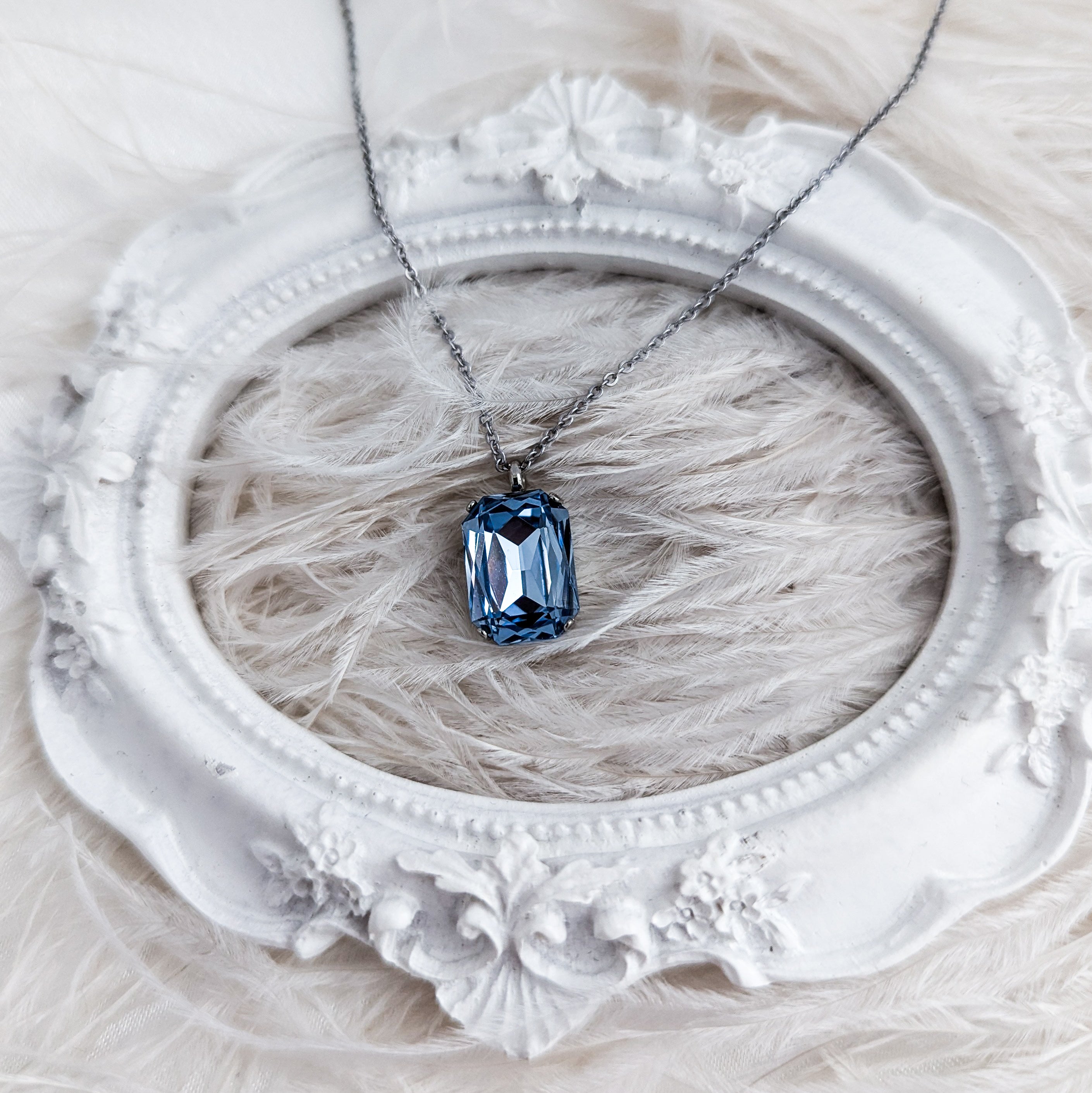 Light dusty blue crystal silver emerald cut necklace