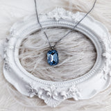 Light dusty blue crystal silver emerald cut necklace