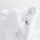 Light dusty blue crystal silver emerald cut drop earrings