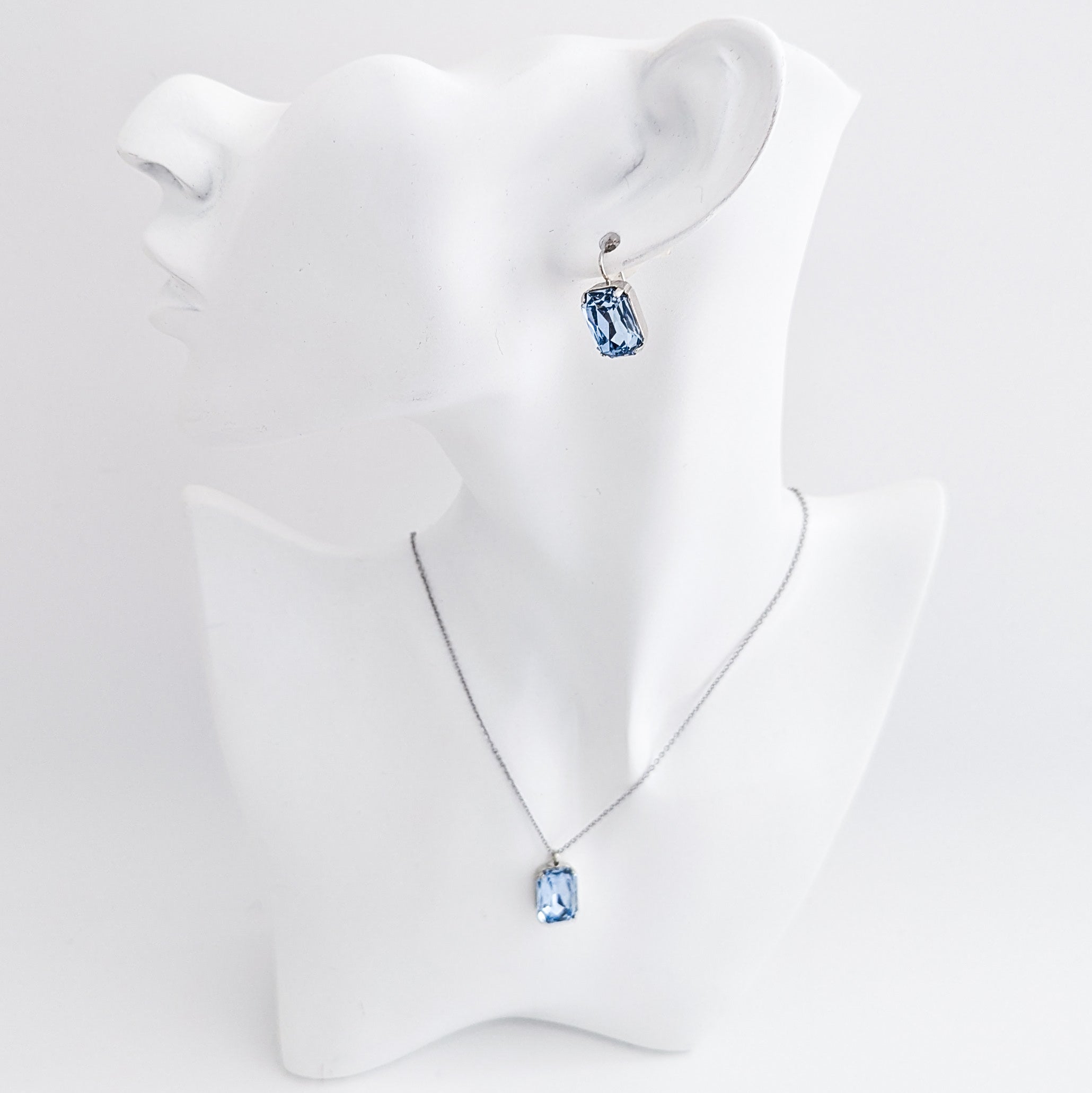 Light dusty blue crystal silver emerald cut drop earrings