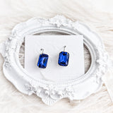 Sapphire blue crystal silver emerald cut drop earrings